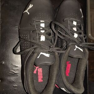 Puma Black Sneakers with White Logos and Red Insole Accents